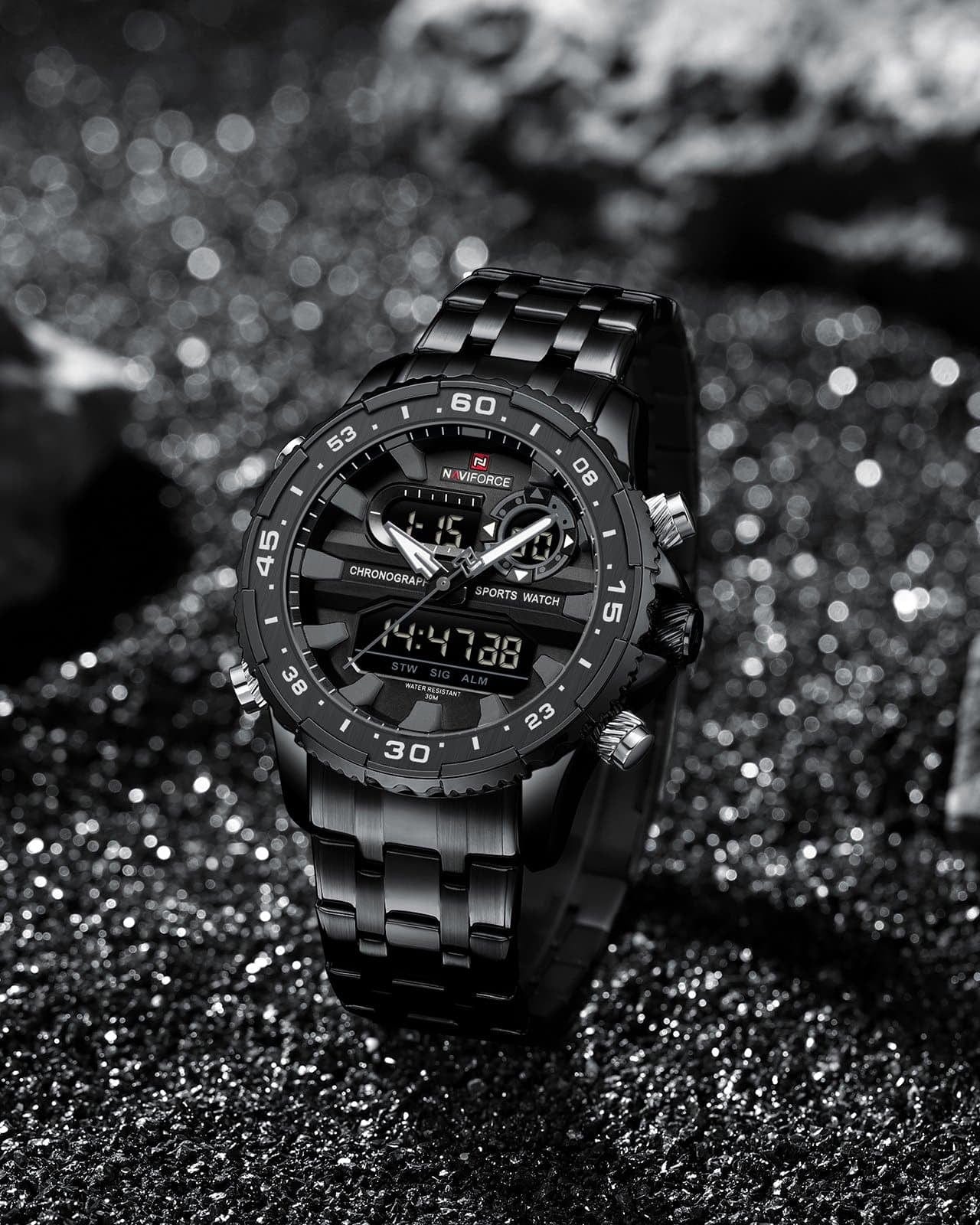 Muški sat Naviforce NF9234 u crnoj varijanti u lifestyle fotografiji, metalna narukvica i moderan dizajn