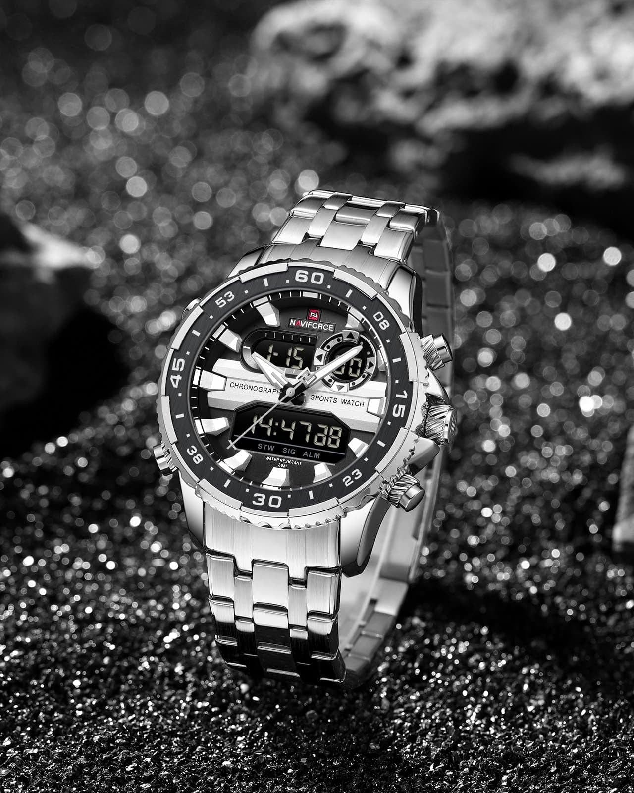 Bocni levi prikaz prednje strane kucista i metalne narukvice muskog sata NaviForce NF9234 u srebrno crnoj boji. Najbolja cena i prodaja u Srbiji