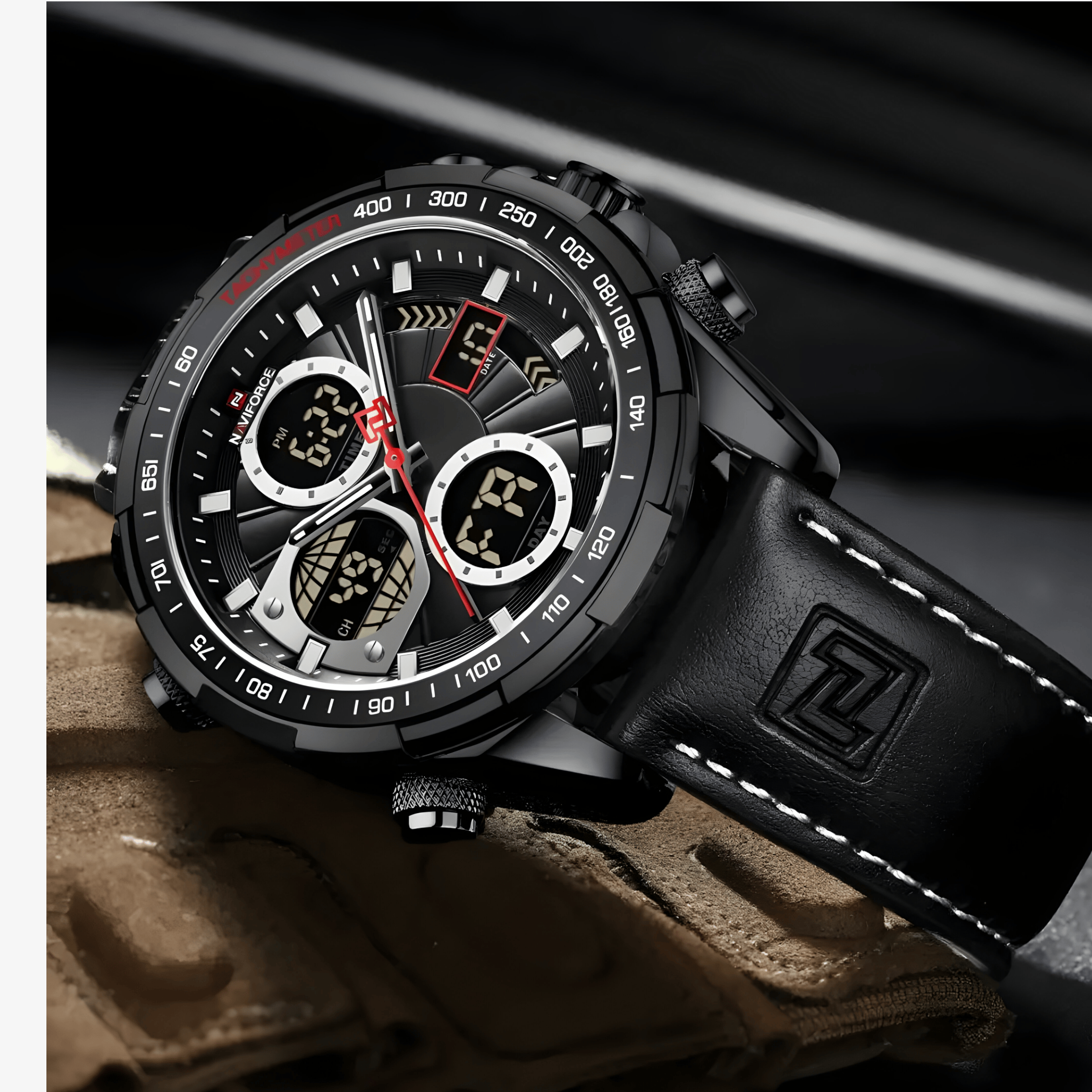 Muški sat NaviForce Ranger NF9197 bočno položen na podlozi, crni model sa kožnom narukvicom