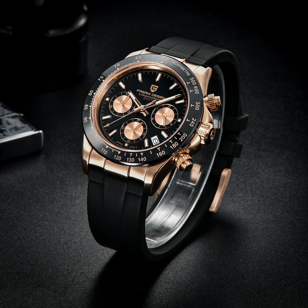 Muški ručni sat Pagani Design PD1664 Daytona rose gold sa silikonskom narukvicom na dekorativnoj pozadini