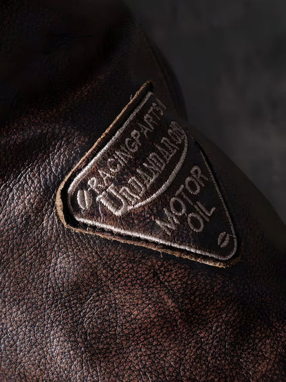 Muška jakna Canyon Brown braon krupan plan teksture kože i preciznog šava